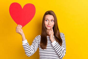 Photo of think brunette young lady look heart wear white pullover isolated on yellow color background