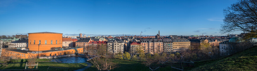 Panorama view over the district Norrmalm from the hill Observatorielunden, roofs of old apartment buildings and the church Engelbrektskyrkan an sunny autumn day in Stockholm