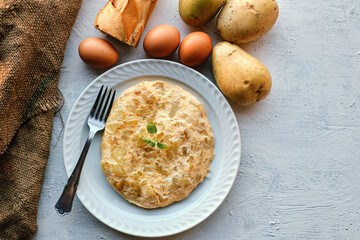 Spanish omelette tapa with potatoes and onion,