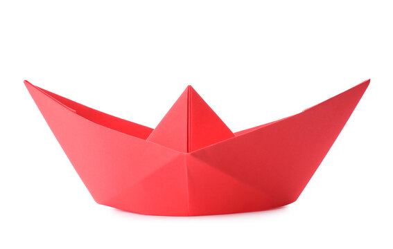 Handmade red paper boat isolated on white. Origami art