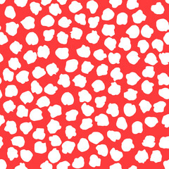 Polka dot white abstract seamless pattern on a red background. Vector design for textile, backgrounds, clothes, wrapping paper, web sites and wallpaper. Fashion illustration seamless pattern.