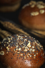 Assortment of small round brioche buns with homemade seeds