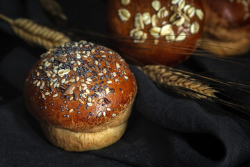 Assortment of small round brioche buns with homemade seeds