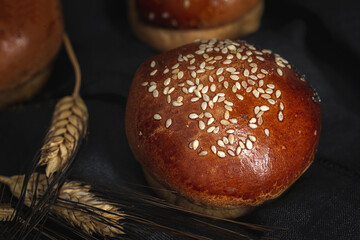 Assortment of small round brioche buns with homemade seeds