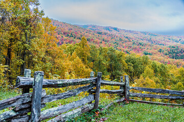 fence overlooking the autumn colors