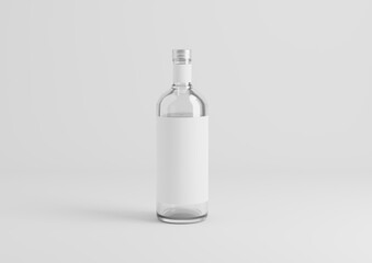 Blank transparent wine bottle with glasses on the empty background