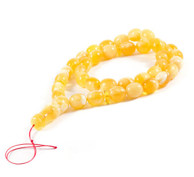Baltic amber rosary isolated on white