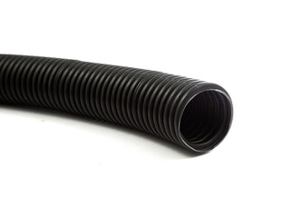 Black plastic corrugated pipe isolated on white background