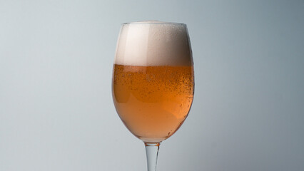 glass of beer on dark background