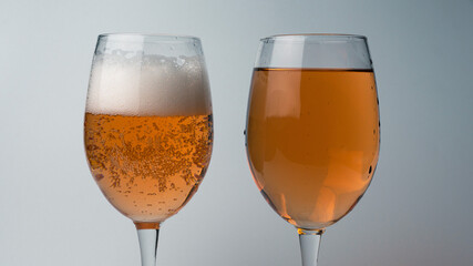 two glasses of champagne on white background