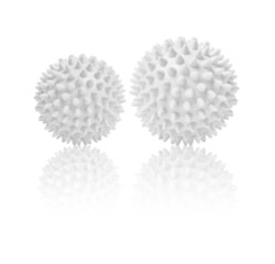 Two white spiny massage balls isolated on white. Concept of physiotherapy or fitness. Closeup of a colorful rubber ball for dog teeth on a white color background. Corona virus model. Snowflake.