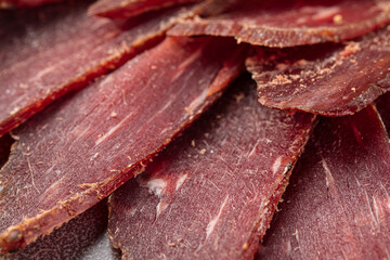 Closeup on sliced dry meat basturma appetizer