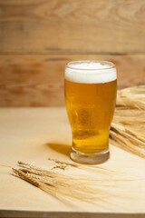 Glass of beer with barley