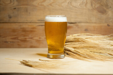 Glass of beer with barley