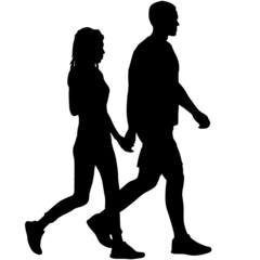Fototapeta premium Silhouette man and woman walking hand in hand