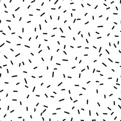 Random placed black strokes seamless repeat pattern. Short vector lines all over minimal print on white background.