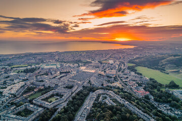 Obraz premium Aerial view of Edinburgh castle looms overlooking the Old Town. Edinburgh Castle is one of the most important and historic castles in Scotland. Edinburgh Castle has been Edinburgh's dominant landmark