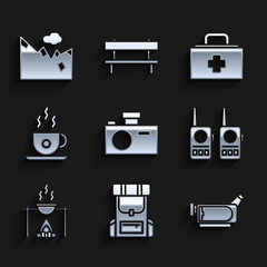 Set Photo camera, Hiking backpack, Cinema, Walkie talkie, Campfire and pot, Coffee cup, First aid kit and Mountains icon. Vector