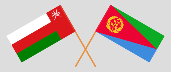 Crossed flags of Oman and Eritrea. Official colors. Correct proportion