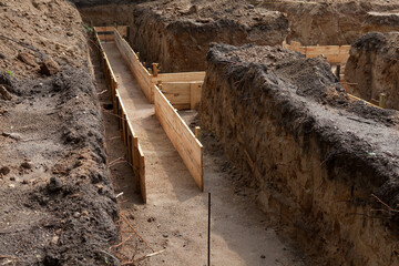 Clapboards for concrete foundation of a house