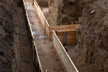 Obraz premium Clapboards for concrete foundation of a house