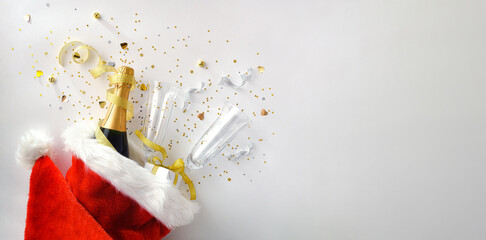 Christmas holidays celebration concept background with bottle on noel hat