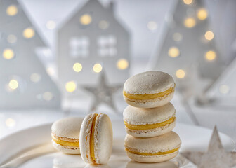 White macaroons with light bulb background