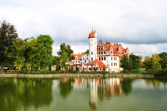 View of Basedow Castle on a summer day with ripples on the water