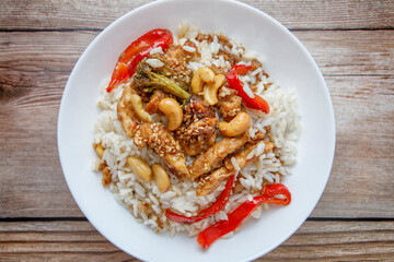 Teriyaki chicken with rice, bell pepper and sesame