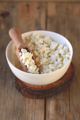 Fresh homemade cottage cheese in a bowl.