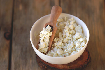 Fresh homemade cottage cheese in a bowl.