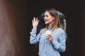 Fototapeta premium Business woman in a cafe outdoors fresh air summer