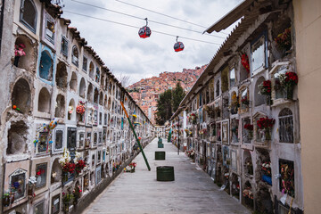 A view of two cable cars gondolas which are a part of the Teleferico system in La Paz Bolivia in...