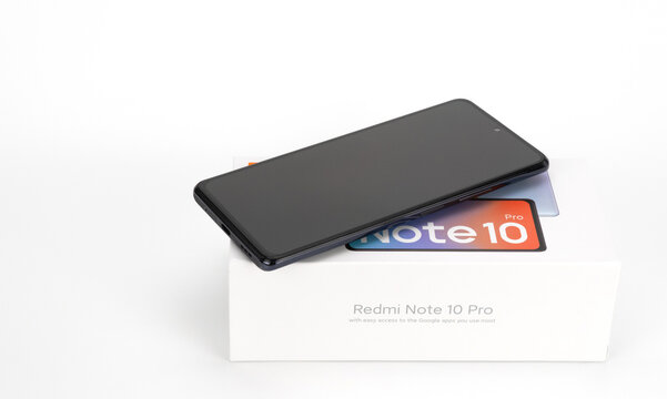 Russia, Krasnoyarsk, october 2021: smartphone xiaomi redmi note 10 pro. new cell phone with a camera is on the box.