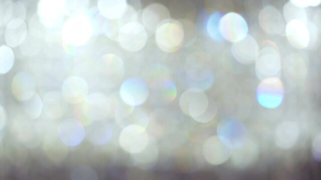 Abstract bokeh lights with soft light background, Bokeh blurred of Chrystal chandelier.