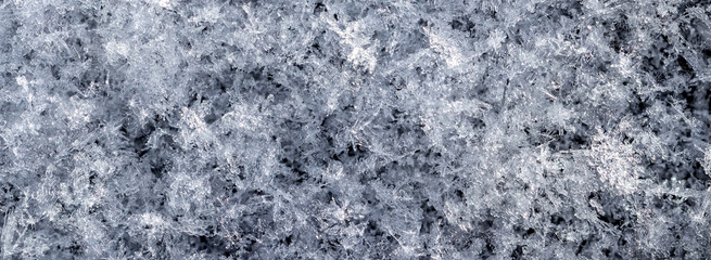 Solid background of transparent snowflakes