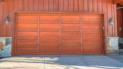 Pano Home facade in Park City Utah with view of the front door and attached garage