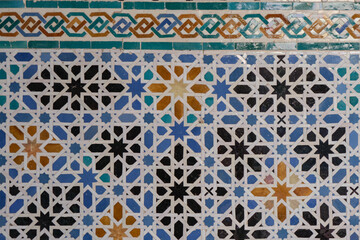 Patios, courtyards garden halls hallways colonnades frescoes tiles pillars in Moorish Arabian...