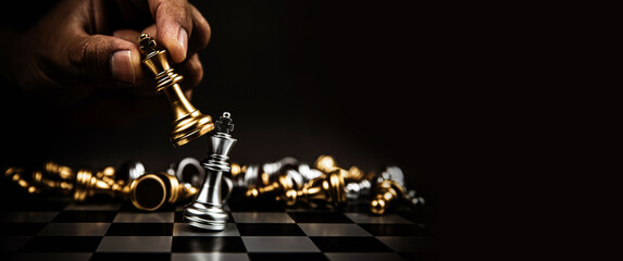 Close up king chess challenge or battle fighting on chess board concepts of leadership and strategy or strategic plan and human resource or risk management or team player.