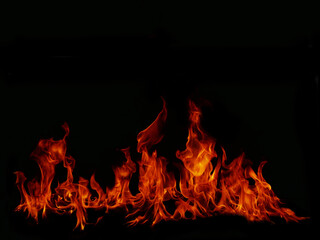Obraz premium Flame Flame Texture For Strange Shape Fire Background Flame meat that is burned from the stove or from cooking. danger feeling abstract black background Suitable for banners or advertisements.