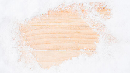Wood snow. Winter wooden texture background. Christmas board with old rustic wall, white frozen ice. Top view with copy space.