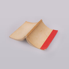 Old open book isolated on a white background