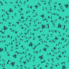 Black Old hourglass with flowing sand icon isolated seamless pattern on green background. Sand clock sign. Business and time management concept. Vector