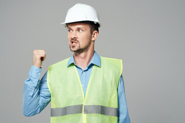 worker in a white helmet engineer safety isolated background