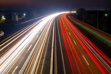 Night Car Traffic With Trails on a Suburban Highway