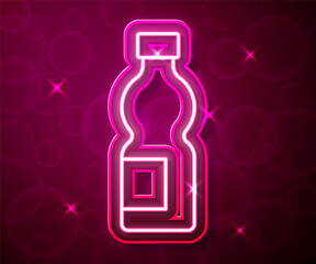 Glowing neon line Bottle of water icon isolated on red background. Soda aqua drink sign. Vector