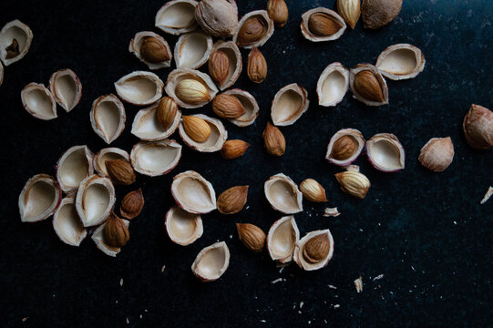 Plum seeds on bacl background