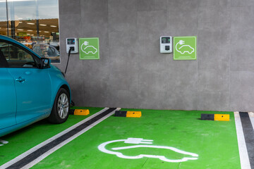 Electric car green color parking for parking and charging. Vehicles to improve the environment...