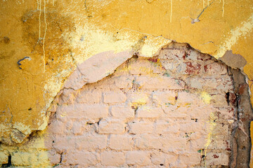 Grunge texture of old brick wall and plaster