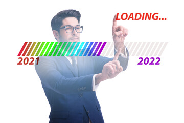 Businessman pressing virtual button with year 2022